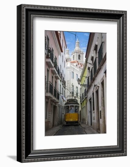 Famous Tram 28 Going Through the Old Quarter of Alfama, Lisbon, Portugal, Europe-Michael Runkel-Framed Photographic Print