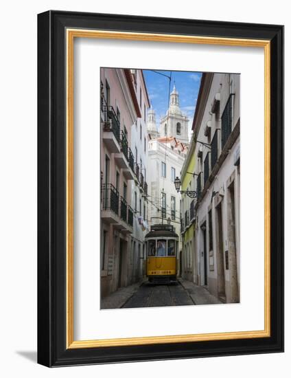 Famous Tram 28 Going Through the Old Quarter of Alfama, Lisbon, Portugal, Europe-Michael Runkel-Framed Photographic Print