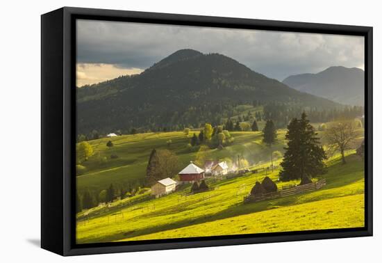 Farm and Haystacks in the Rural Transylvania Landscape at Sunset, Piatra Fantanele, Transylvania-Matthew Williams-Ellis-Framed Premier Image Canvas