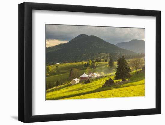 Farm and Haystacks in the Rural Transylvania Landscape at Sunset, Piatra Fantanele, Transylvania-Matthew Williams-Ellis-Framed Photographic Print