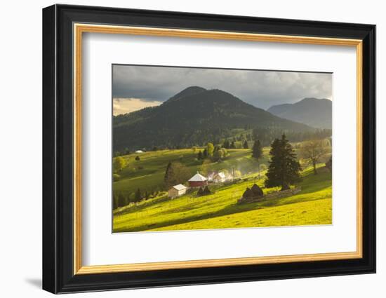 Farm and Haystacks in the Rural Transylvania Landscape at Sunset, Piatra Fantanele, Transylvania-Matthew Williams-Ellis-Framed Photographic Print