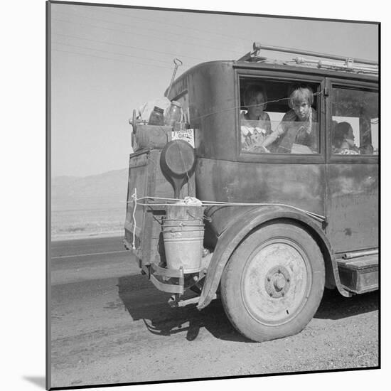 Farm family drive away from the Dust Bowl, 1936-Dorothea Lange-Mounted Photographic Print