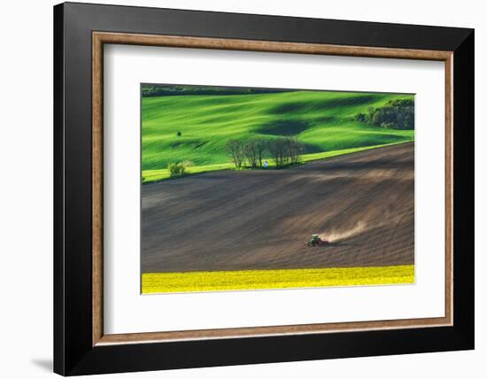 Farm Tractor Handles Earth on Field - Preparing Farmland for Sowing, Agricultural Landscape-Dmytro Balkhovitin-Framed Photographic Print