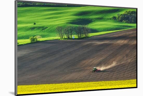 Farm Tractor Handles Earth on Field - Preparing Farmland for Sowing, Agricultural Landscape-Dmytro Balkhovitin-Mounted Photographic Print