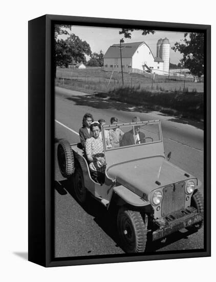 Farmer and Family Riding in a Jeep in Demonstration of Postwar Uses for Military Vehicles-null-Framed Premier Image Canvas
