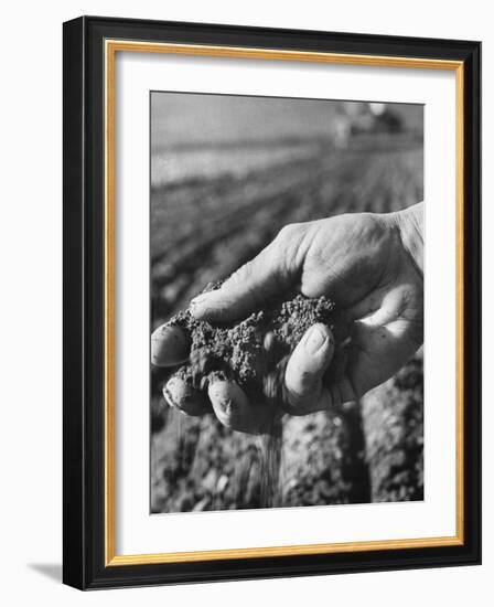 Farmer Holding a Handful of Soil-Ed Clark-Framed Photographic Print