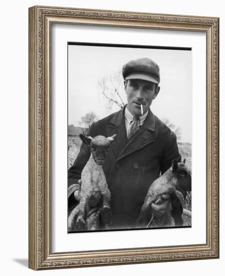 Farmer Holding His New Born Lambs in the Cotswolds-Henry Grant-Framed Photographic Print