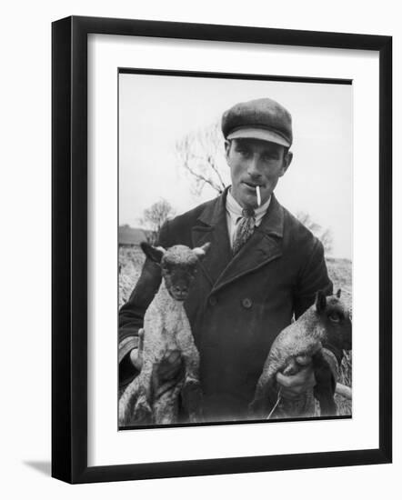 Farmer Holding His New Born Lambs in the Cotswolds-Henry Grant-Framed Photographic Print