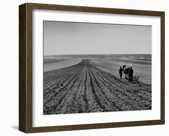 Farmer Lossening Top Soil of His Field-Dmitri Kessel-Framed Photographic Print