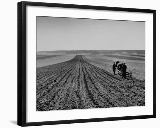 Farmer Lossening Top Soil of His Field-Dmitri Kessel-Framed Photographic Print