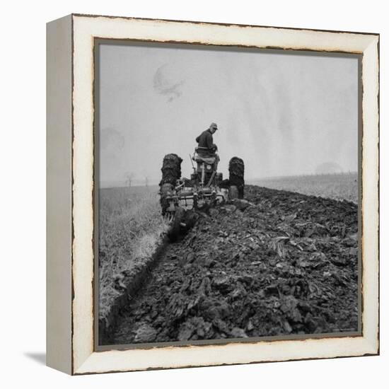 Farmer Plowing with a Tractor on an Iowa Farm-Gordon Parks-Framed Premier Image Canvas