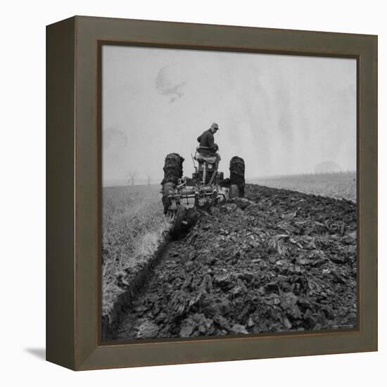 Farmer Plowing with a Tractor on an Iowa Farm-Gordon Parks-Framed Premier Image Canvas