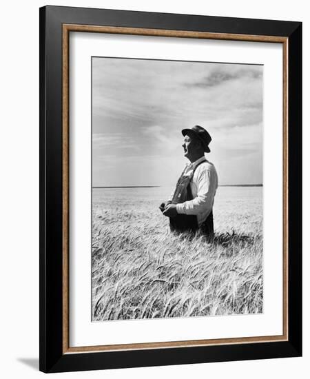 Farmer Posing in His Wheat Field-Ed Clark-Framed Photographic Print