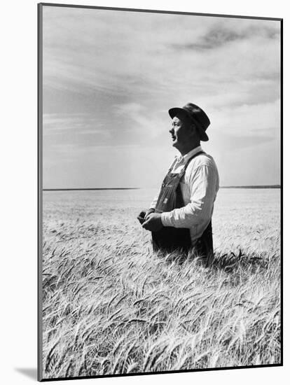 Farmer Posing in His Wheat Field-Ed Clark-Mounted Photographic Print