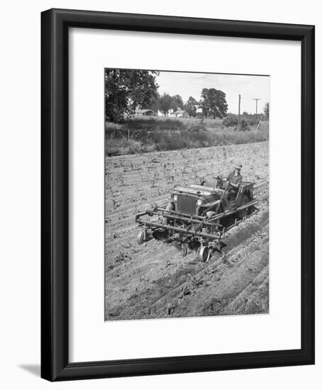 Farmer Using Jeep as a Cultivator in Demonstration of Postwar Uses for Military Vehicles-null-Framed Photographic Print