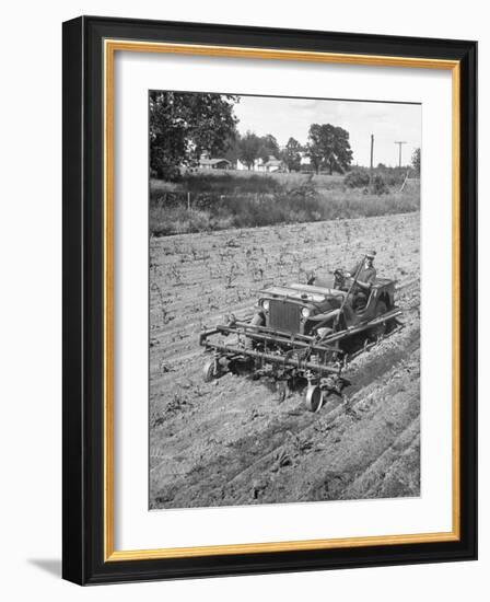 Farmer Using Jeep as a Cultivator in Demonstration of Postwar Uses for Military Vehicles-null-Framed Photographic Print