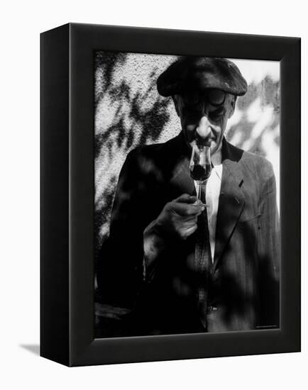 Farmer Who Has Brought His Grapes to the Hennessy and Co. Distillery Sampling Some Brandy-Gjon Mili-Framed Premier Image Canvas