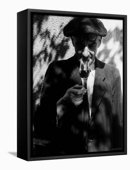 Farmer Who Has Brought His Grapes to the Hennessy and Co. Distillery Sampling Some Brandy-Gjon Mili-Framed Premier Image Canvas