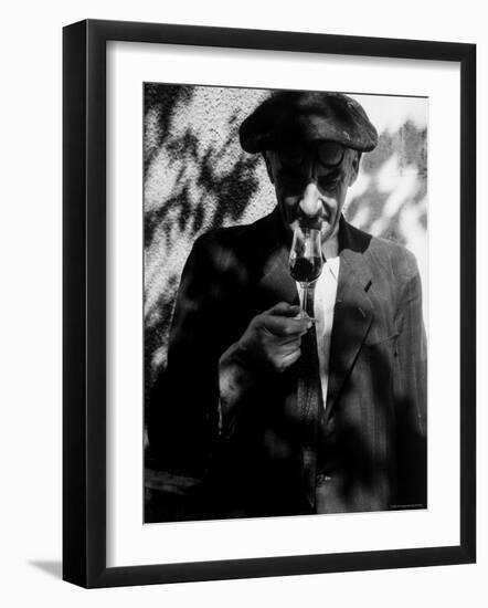 Farmer Who Has Brought His Grapes to the Hennessy and Co. Distillery Sampling Some Brandy-Gjon Mili-Framed Photographic Print