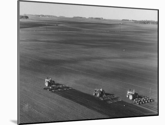 Farmers Planting Corn on Hamilton Farm-Michael Rougier-Mounted Photographic Print