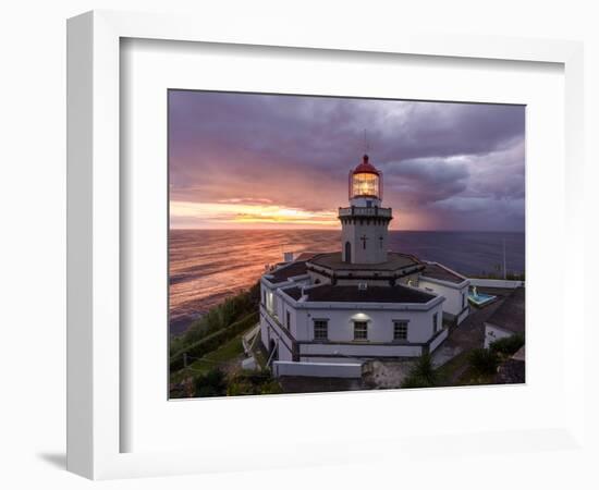 Farol do Arnel lighthouse at sunrise in a cloudy morning, Sao Miguel island, Azores, Portugal-Francesco Fanti-Framed Photographic Print