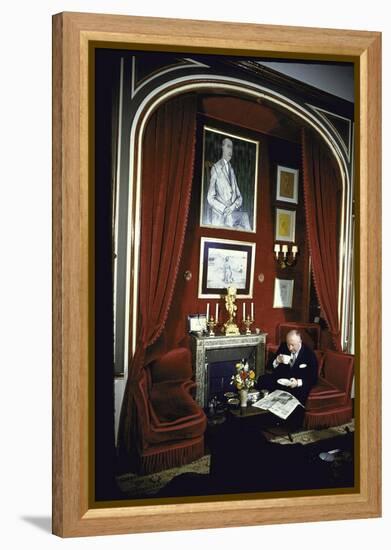 Fashion Designer Christian Dior Having Coffee While Reading Newspaper-Loomis Dean-Framed Premier Image Canvas