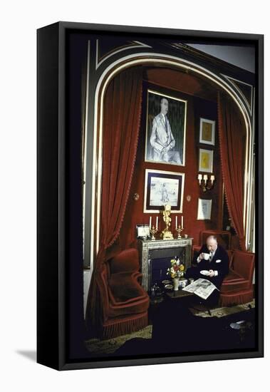 Fashion Designer Christian Dior Having Coffee While Reading Newspaper-Loomis Dean-Framed Premier Image Canvas