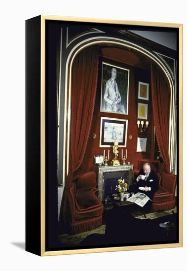 Fashion Designer Christian Dior Having Coffee While Reading Newspaper-Loomis Dean-Framed Premier Image Canvas