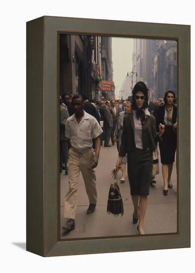 Fashion Model Brigitte Wasserman Walks Along 7th Avenue, New York, New York, 1960-Walter Sanders-Framed Premier Image Canvas