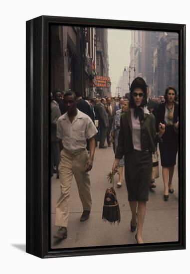 Fashion Model Brigitte Wasserman Walks Along 7th Avenue, New York, New York, 1960-Walter Sanders-Framed Premier Image Canvas