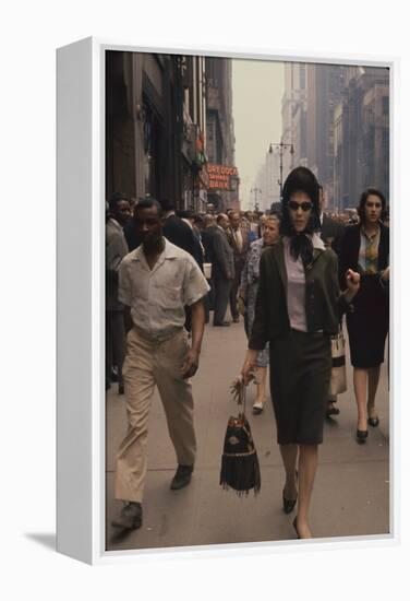 Fashion Model Brigitte Wasserman Walks Along 7th Avenue, New York, New York, 1960-Walter Sanders-Framed Premier Image Canvas