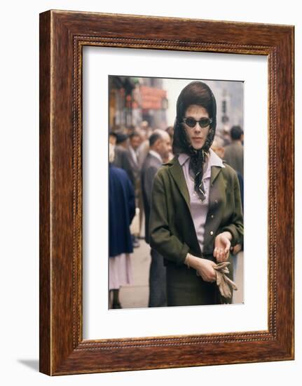 Fashion Model Brigitte Wasserman Walks Along 7th Avenue, New York, New York, 1960-Walter Sanders-Framed Photographic Print