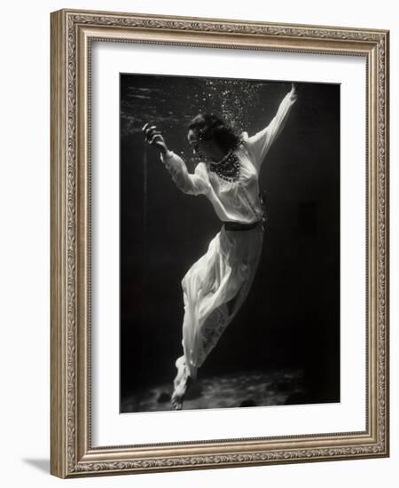 Fashion Model Underwater in Dolphin Tank-null-Framed Photographic Print