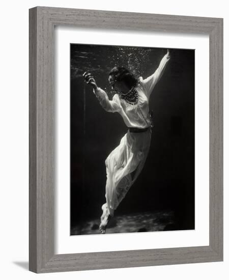 Fashion Model Underwater in Dolphin Tank-null-Framed Photographic Print