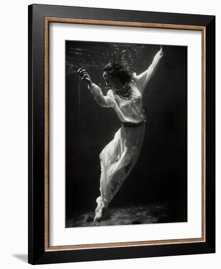 Fashion Model Underwater in Dolphin Tank-null-Framed Photographic Print