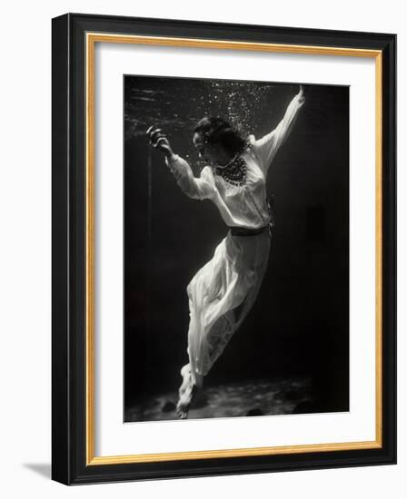 Fashion Model Underwater in Dolphin Tank-null-Framed Photographic Print