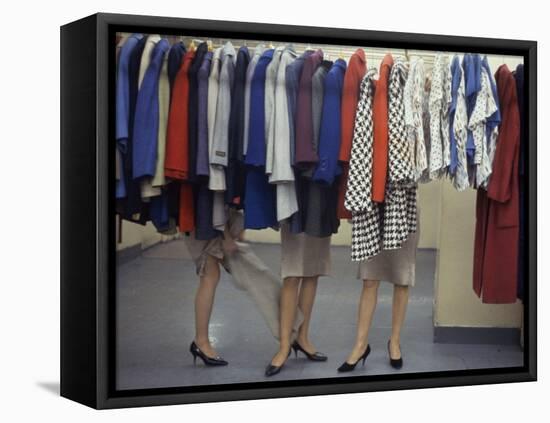 Fashion Models Behind a Suit Rack Trying on Clothes at Zelinka-Matlick, New York, New York, 1960-Walter Sanders-Framed Premier Image Canvas