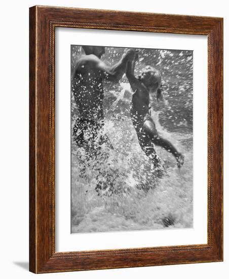 Father and Daughter Playing in the Surf at Jones Beach-Alfred Eisenstaedt-Framed Photographic Print