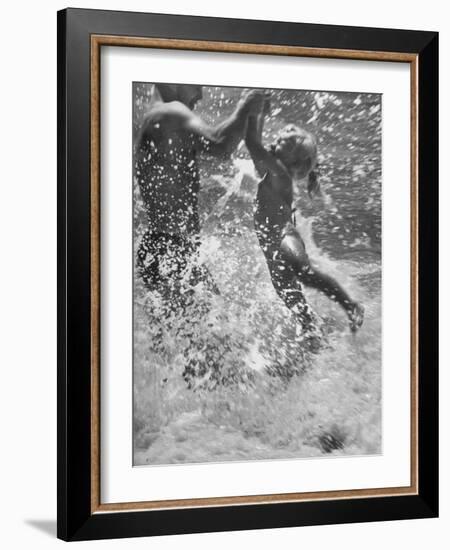 Father and Daughter Playing in the Surf at Jones Beach-Alfred Eisenstaedt-Framed Photographic Print