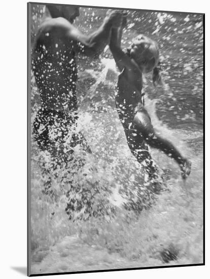 Father and Daughter Playing in the Surf at Jones Beach-Alfred Eisenstaedt-Mounted Photographic Print