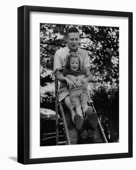 Father and Daughter Playing on Slide During Father's Day at Co-Op Nursery School Owned by Parents-Yale Joel-Framed Photographic Print