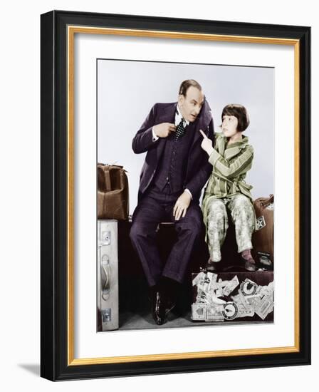 Father and Daughter Sitting Together on Luggage-null-Framed Photo