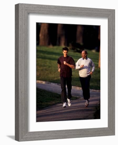 Father and Son Out for a Fitness Run-Paul Sutton-Framed Photographic Print