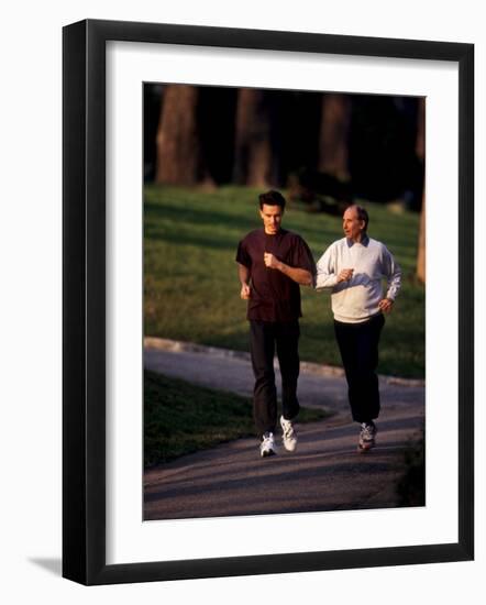 Father and Son Out for a Fitness Run-Paul Sutton-Framed Photographic Print