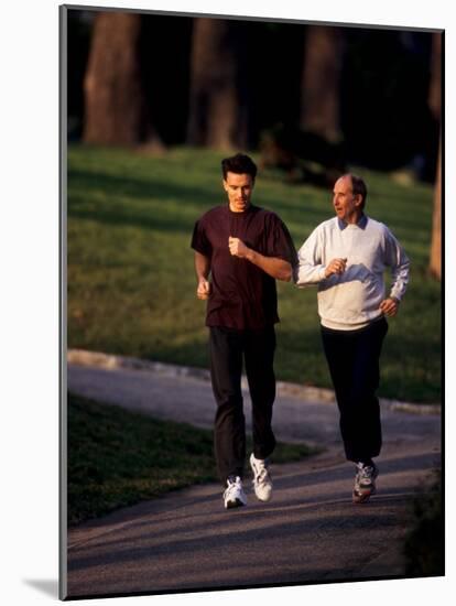 Father and Son Out for a Fitness Run-Paul Sutton-Mounted Photographic Print