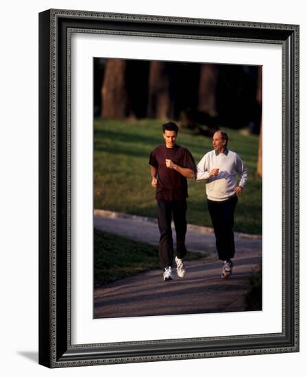 Father and Son Out for a Fitness Run-Paul Sutton-Framed Photographic Print