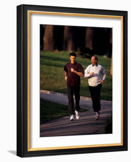 Father and Son Out for a Fitness Run-Paul Sutton-Framed Photographic Print
