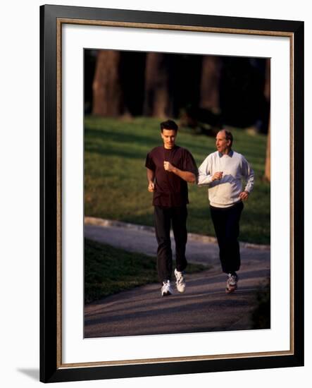 Father and Son Out for a Fitness Run-Paul Sutton-Framed Photographic Print