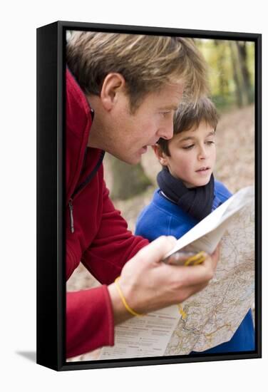 Father And Son Reading a Map-Ian Boddy-Framed Premier Image Canvas