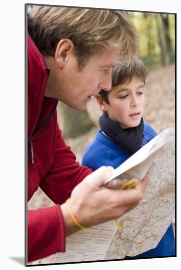 Father And Son Reading a Map-Ian Boddy-Mounted Photographic Print